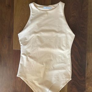 Tan body suit